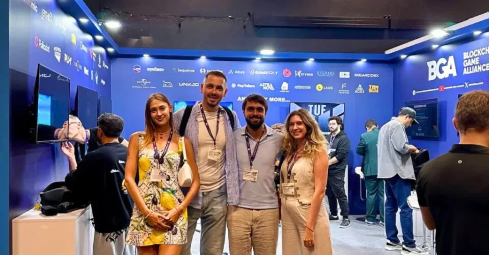 game development team at industry event booth exhibition